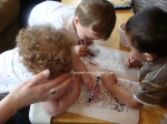 kids coloring together